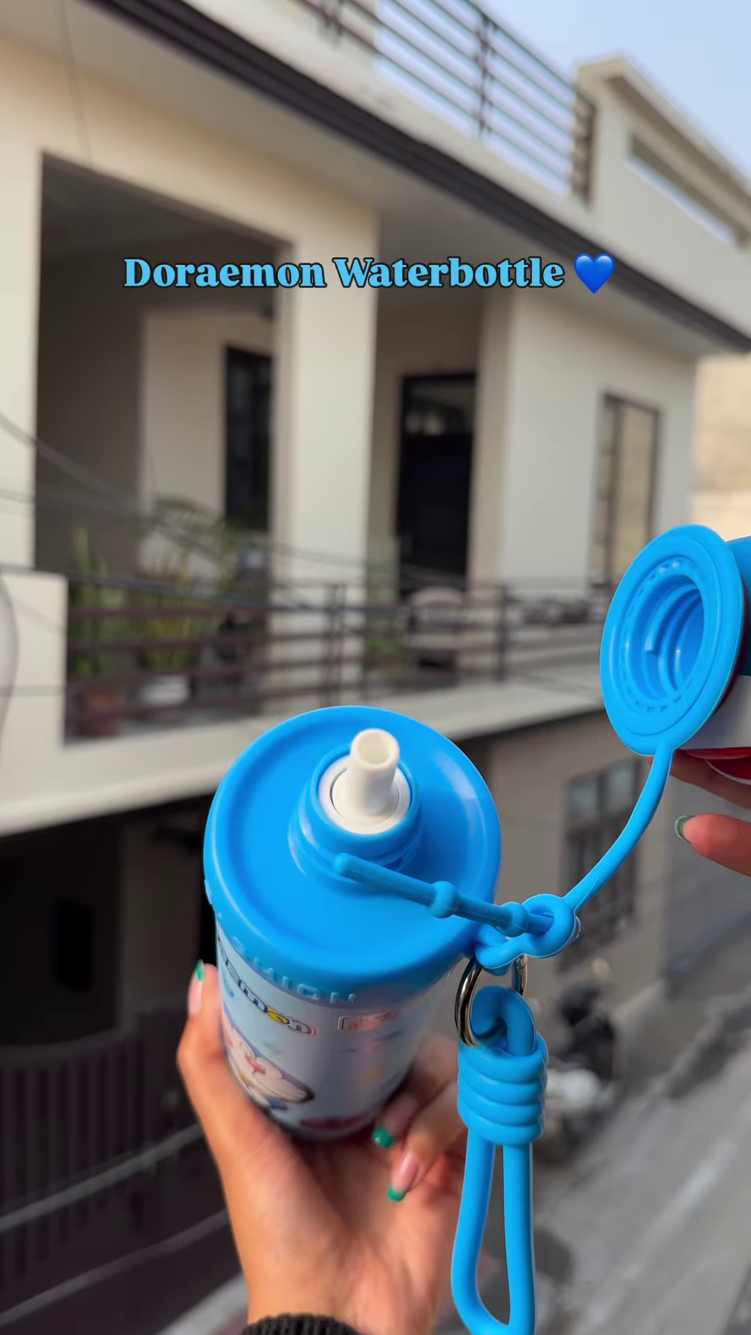 Character-Themed Blue Water Bottle with Interactive 3D Cap - Image 2
