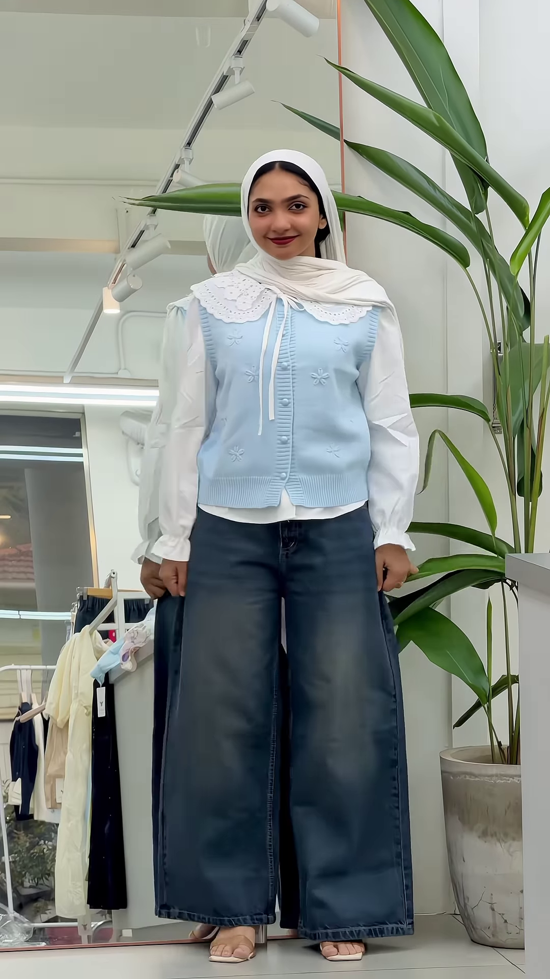 Sky Blue Knitted Vest and White Ruffled Blouse with Wide-Leg Denim