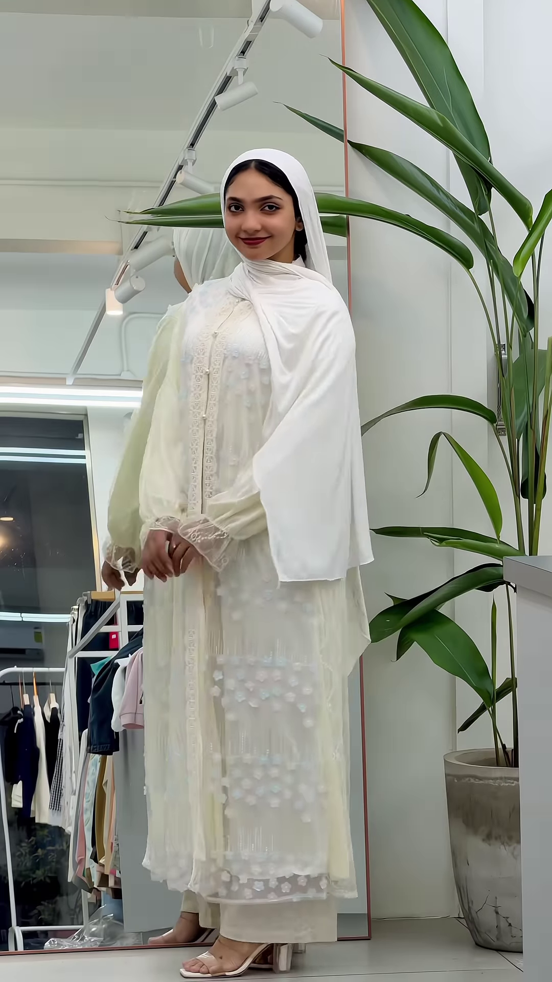 Sky Blue Knitted Vest and White Ruffled Blouse with Wide-Leg Denim - Image 2