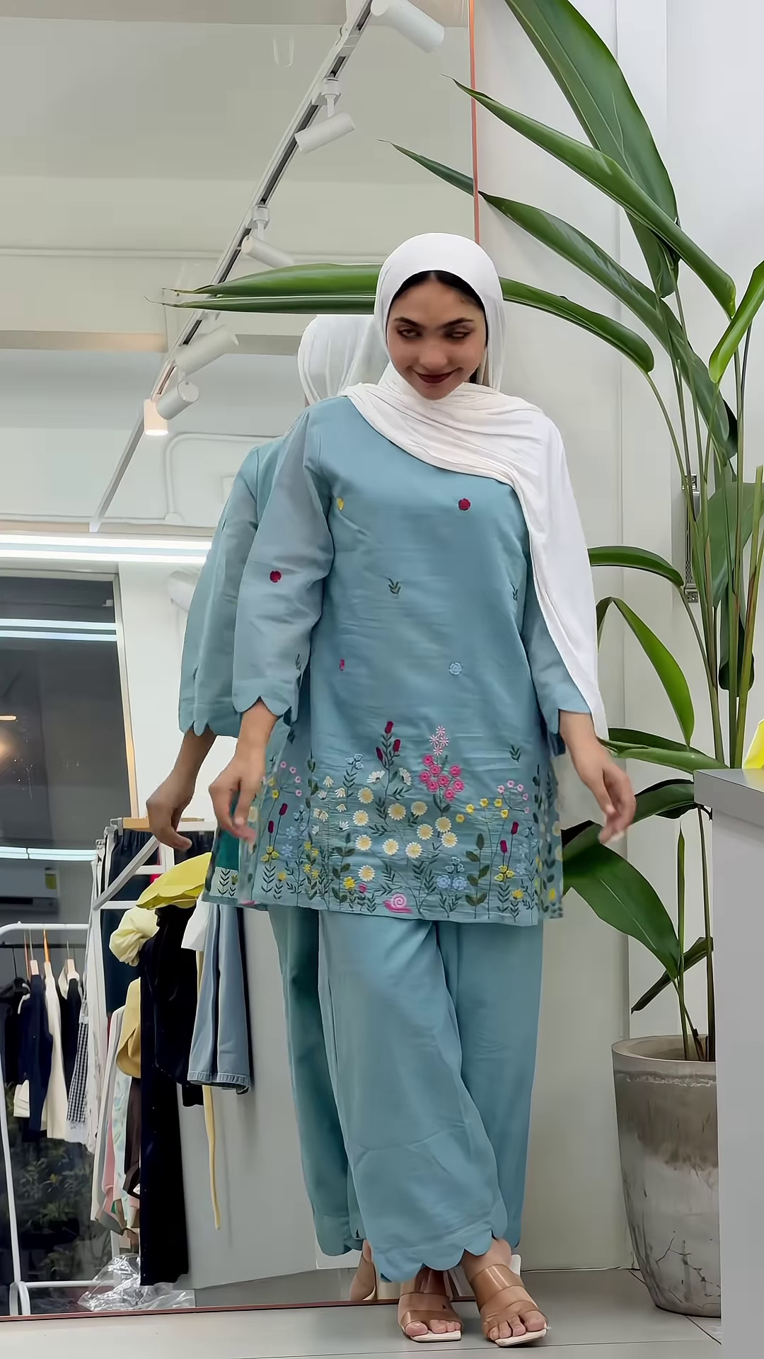 Sky Blue Knitted Vest and White Ruffled Blouse with Wide-Leg Denim - Image 14