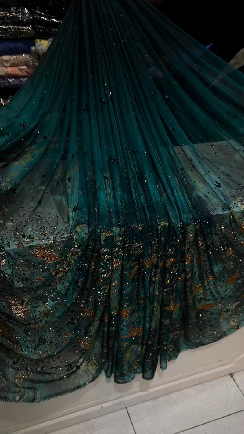 Emerald Enchantment Hand-Embellished Net Saree